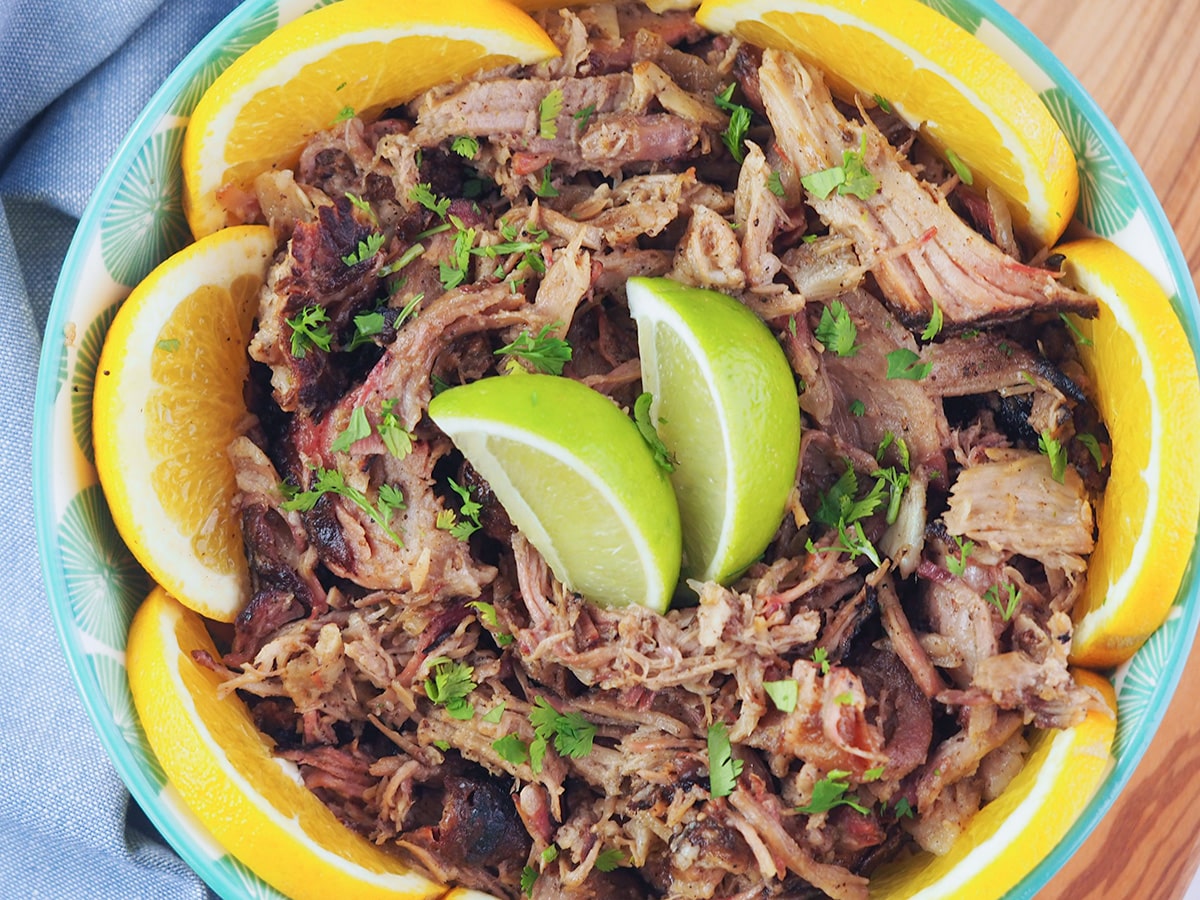 close overhead of pulled mojo pork in bowl
