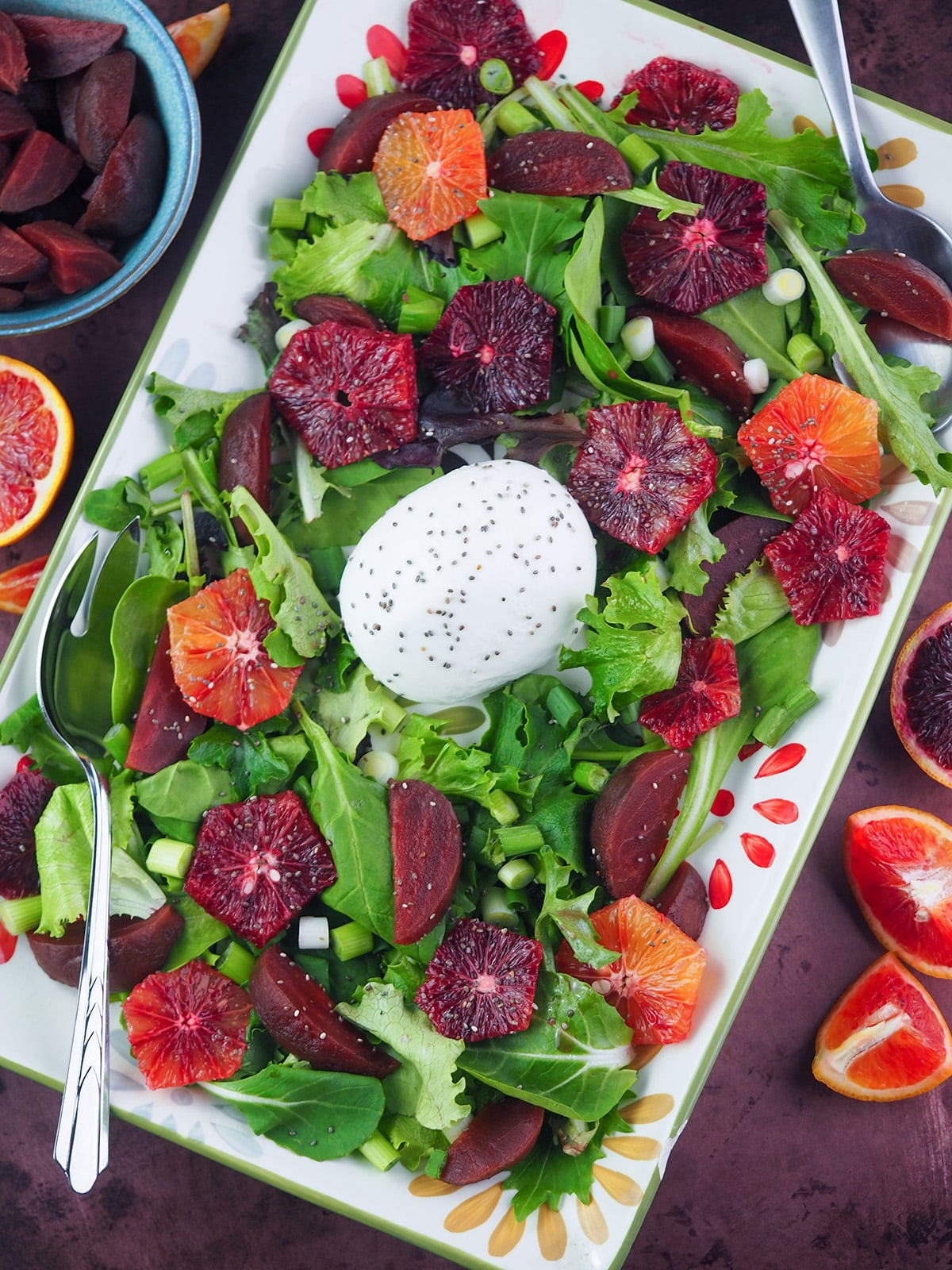 blood orange salad with burrata cheese and beets on table